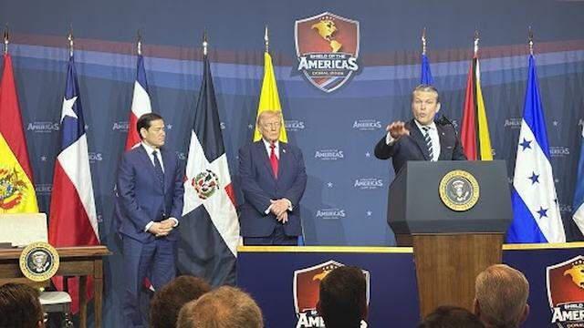 President Donald Trump and Secretary of State Marco Rubio listen to Secretary of Defense Pete Hegseth address the first Summit of the Americas on March 7, 2026, at Trump National Doral Miami.